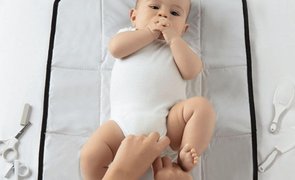 Bebê no Trocador Portátil